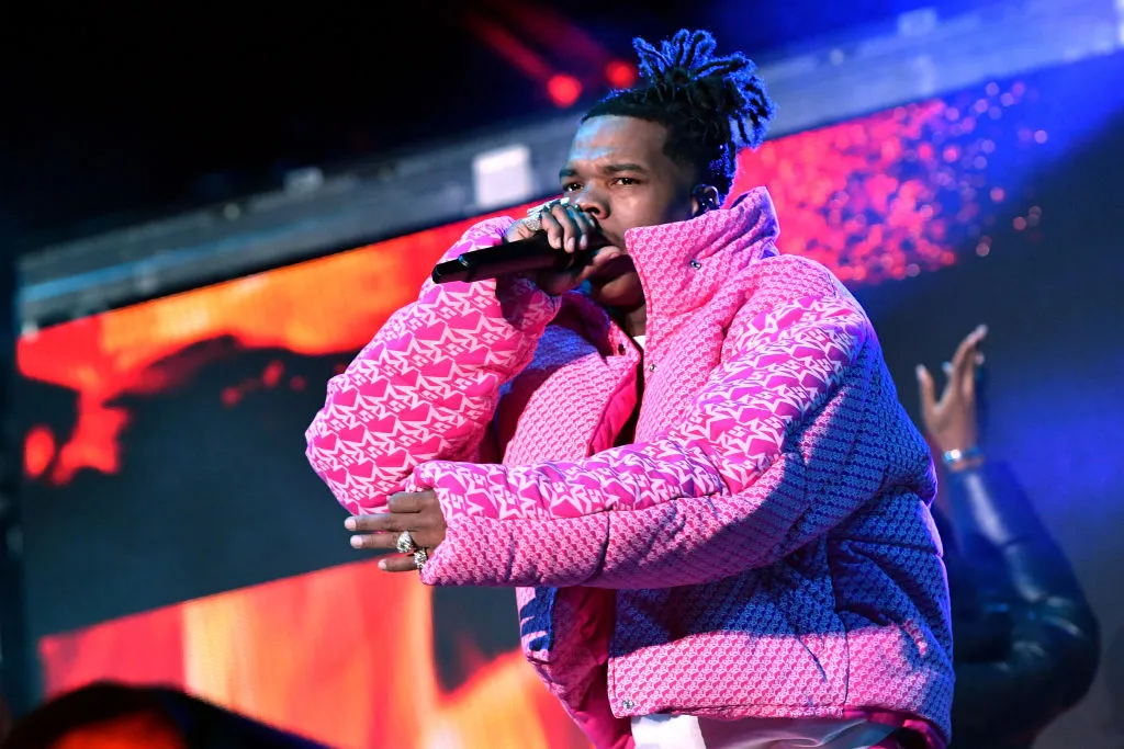 Lil Baby performing live – contributing to his net worth through touring