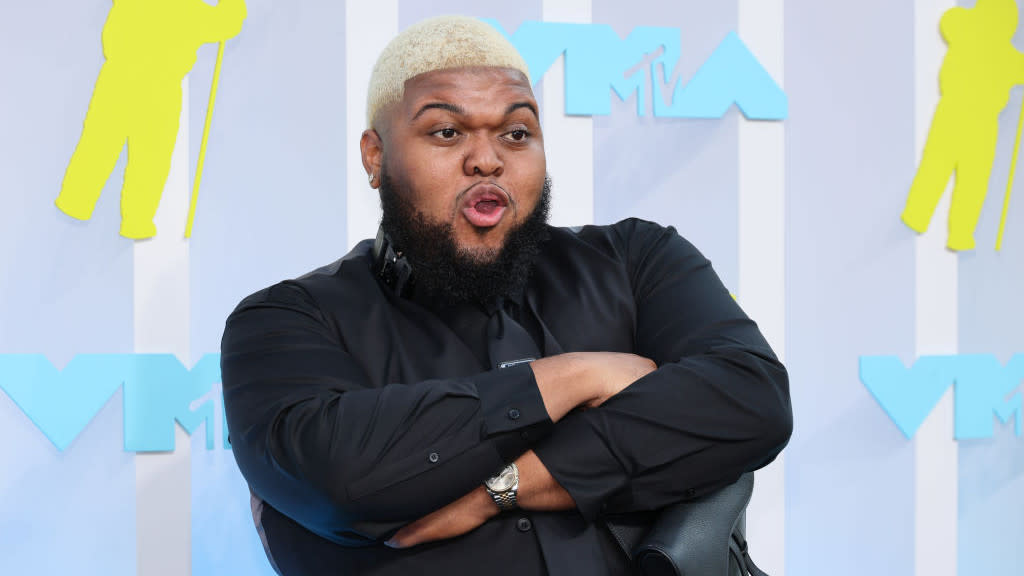 alt="Druski performing live during his 2025 comedy tour"