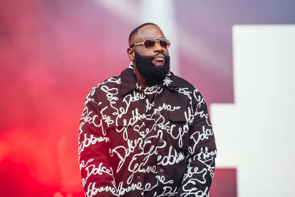 Rick Ross at Wingstop location - Rick Ross business ventures