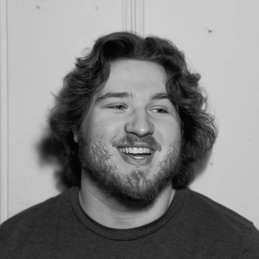 alt="Zachirific filming a TikTok video at home"